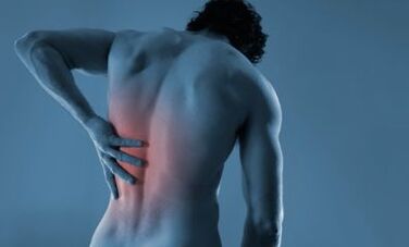 A man suffers from pain in the left shoulder blade