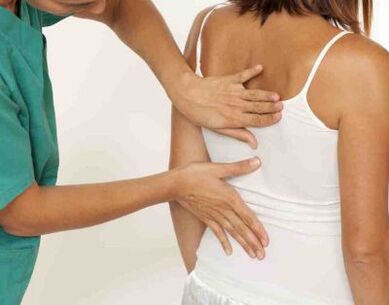 A patient complains of pain in the shoulder blades on both sides at a doctor's examination