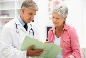 A woman with arthritis at a doctor's meeting